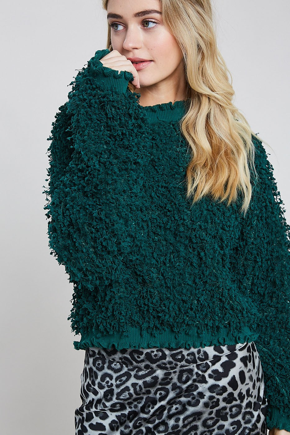 TEXTURED MOCK NECK PULLOVER WITH RUFFLE HEM